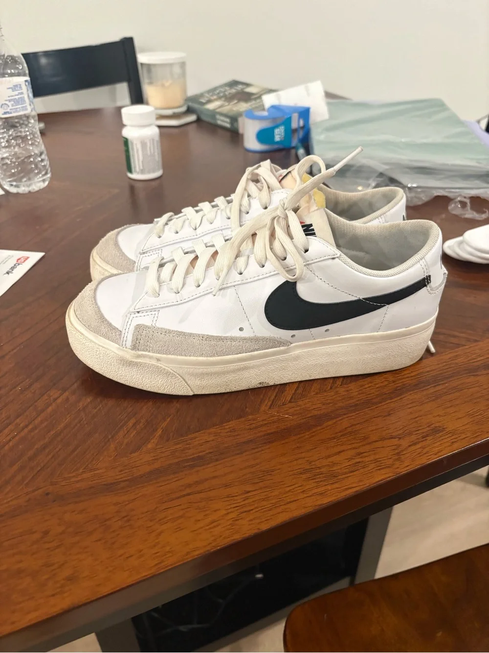 Nike White Sneakers with Black Swoosh and Suede Accents